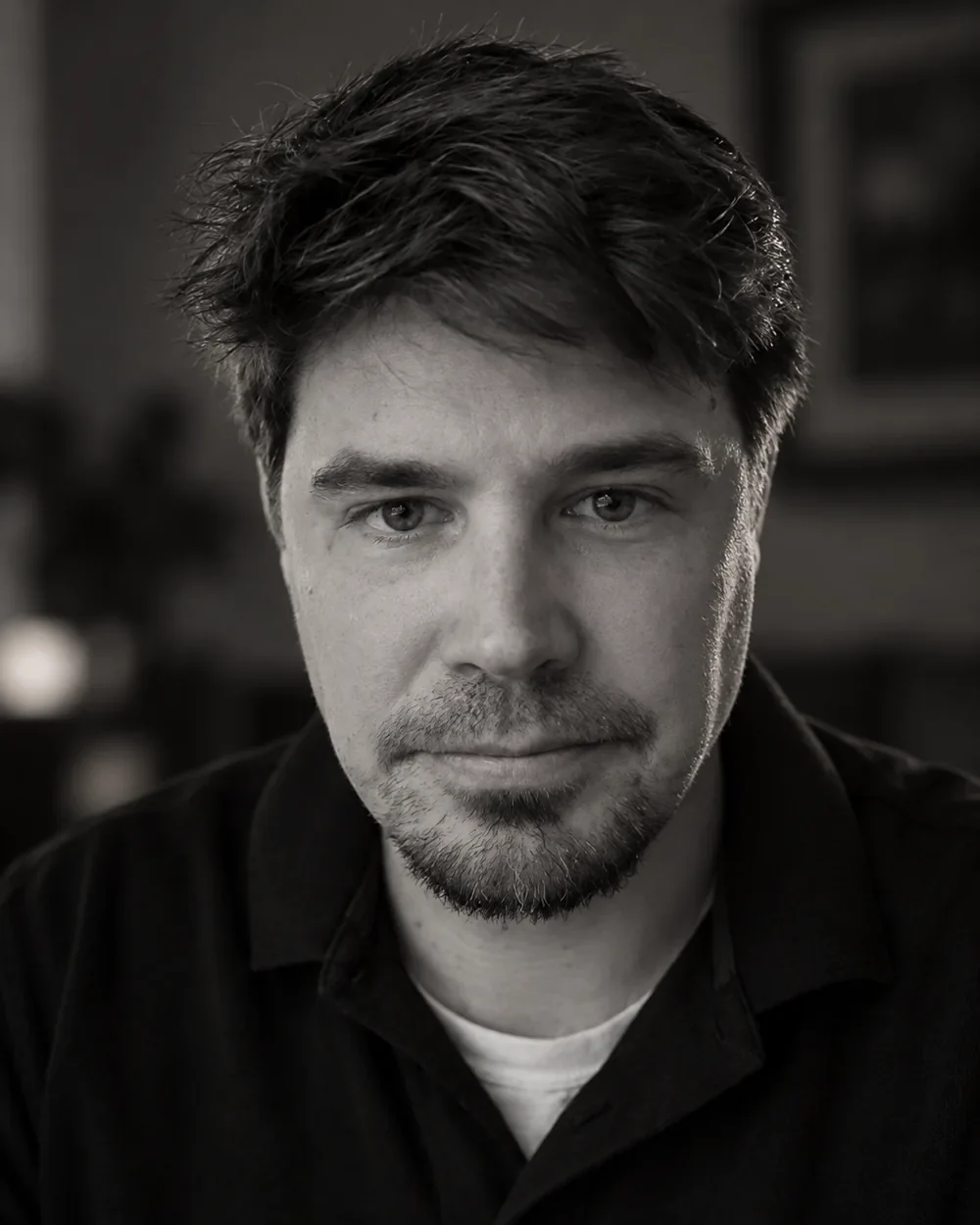 Black and white portrait of Chris Rapple